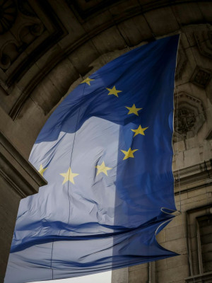 Flag of Europe waving inside a gothic archway