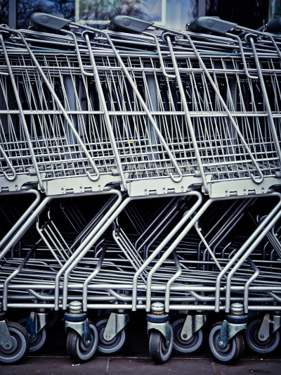 A close up photo of several trolleys grouped together